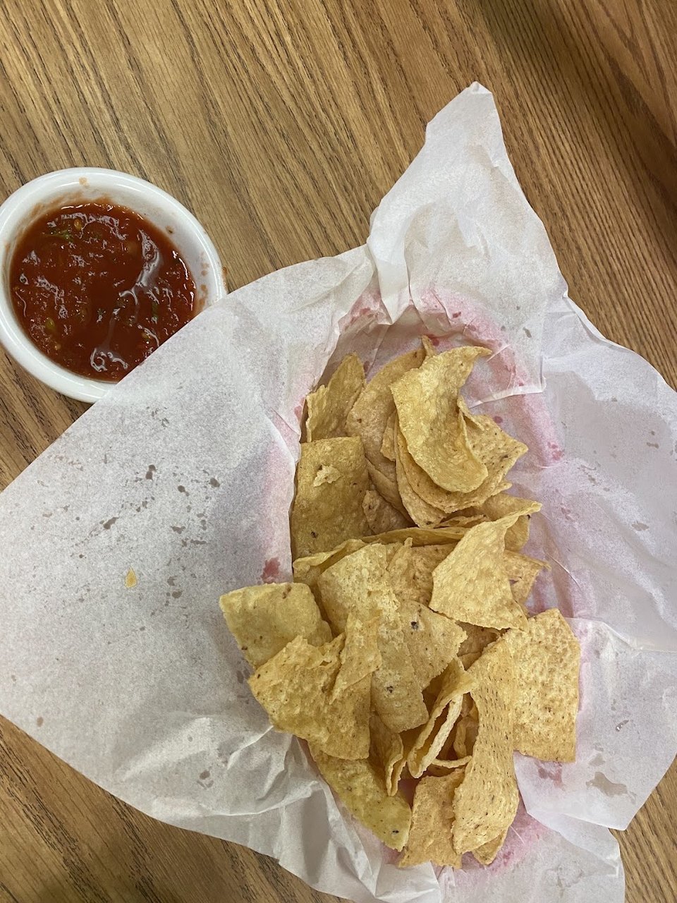 Printed menu with tacos, fajitas, and enchiladas.