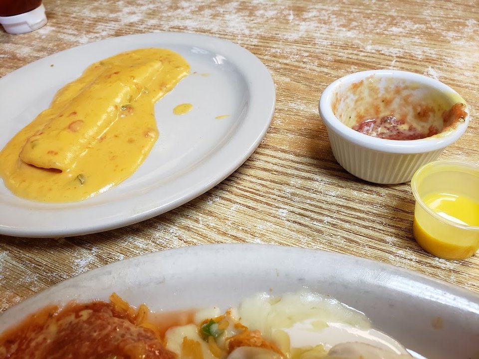 Menu spread with soups, burritos, and desserts.